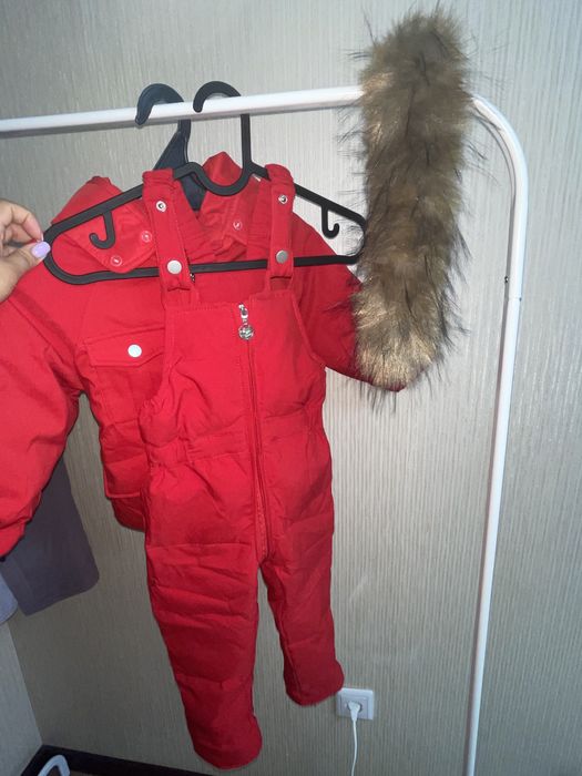 Продам новый зимний комбинезон