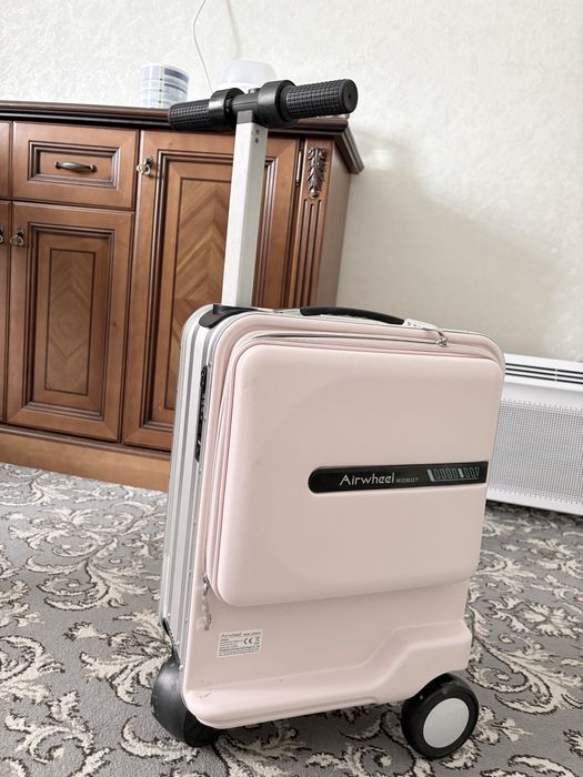 Чемодан-самокат электрический