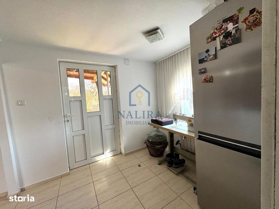 Casa de caramida de vanzare Surdesti cu teren intravilan 5000mp