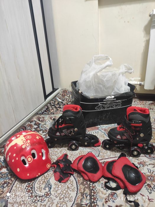 Роликовые коньки