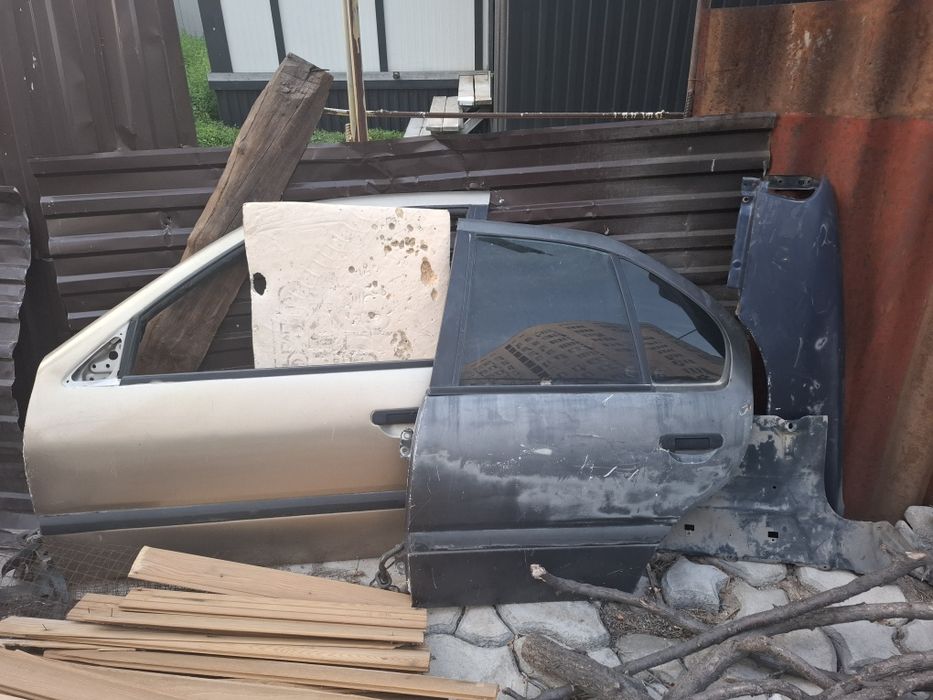 Двери на ниссан примера