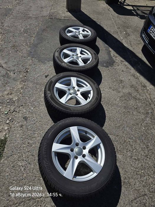 Оригинални лети джанти 16" 5x112 с зимни гуми Bridgestone 215/60/R16 за VW, Audi, Skoda, Seat
