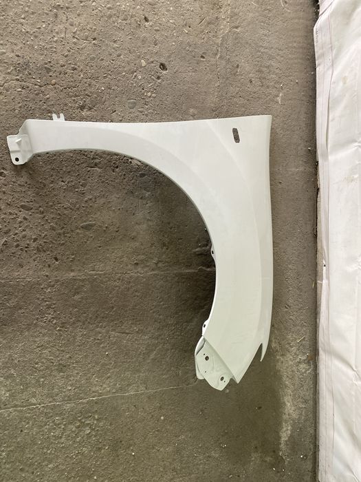 Aripa dreapta fata Logan 2