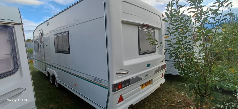 Vând rulota BESACAR  Axa dubla .ptr o locatie fixa ,pat matrimonial ,baie mare pe spate