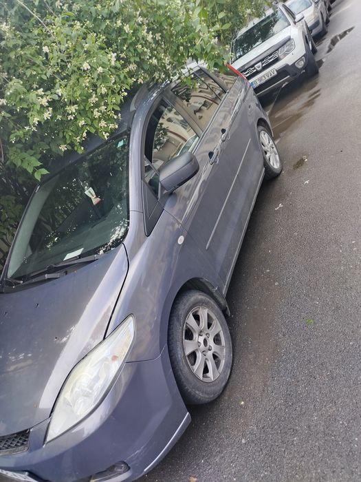 Mazda 5.7locuri .