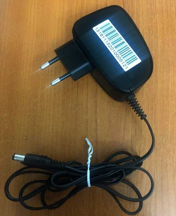 Adaptor AC, model T018WE1225, 12V, 1.5A