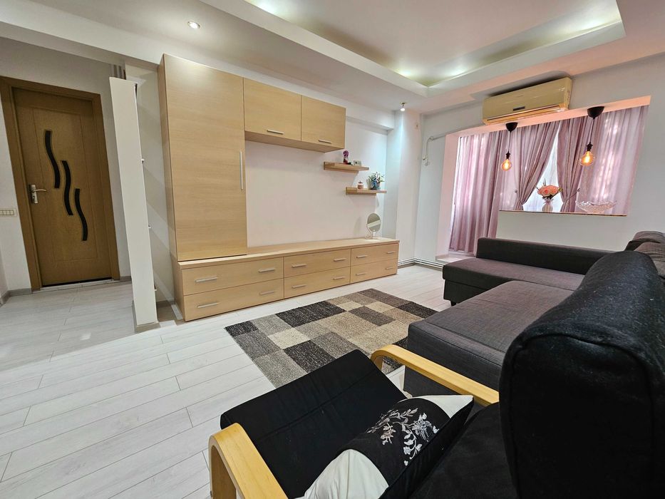 Apartament modern, cu centrala proprie si loc de parcare