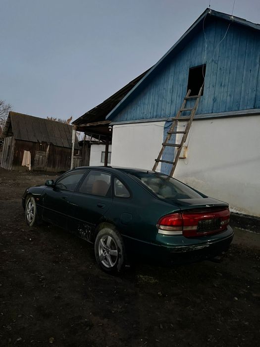 Мазда кронус жасыл түсті