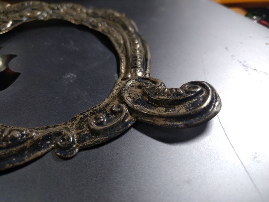 Стара сребърна рамкка за снимки