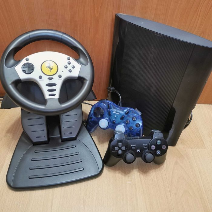 PS3 cu volan si pedale + 50 jocuri si 2 manete