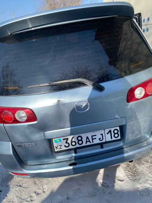 Продам машину Mazda Demio 2004