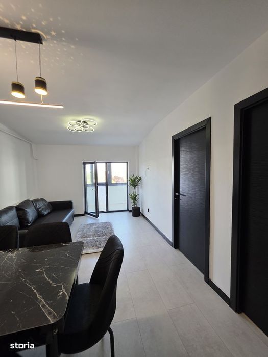 Apartament bloc nou,parcare proprie, mobilat.