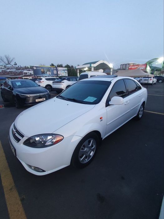 2023 Gentra Lasetti avtomat lyukli oq kraska toza