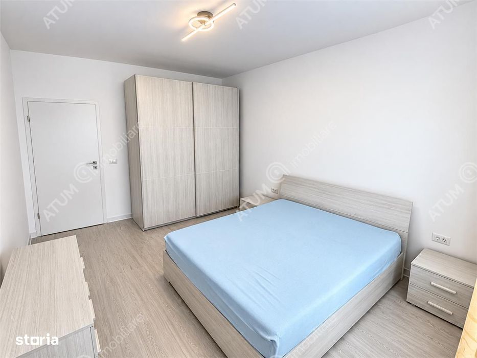 Garsoniera moderna la etajul 1 cu boxa depozitare si parcare proprie — fotografia 3