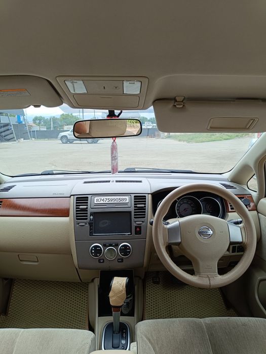 Ниссан тиида 1,5 литр.