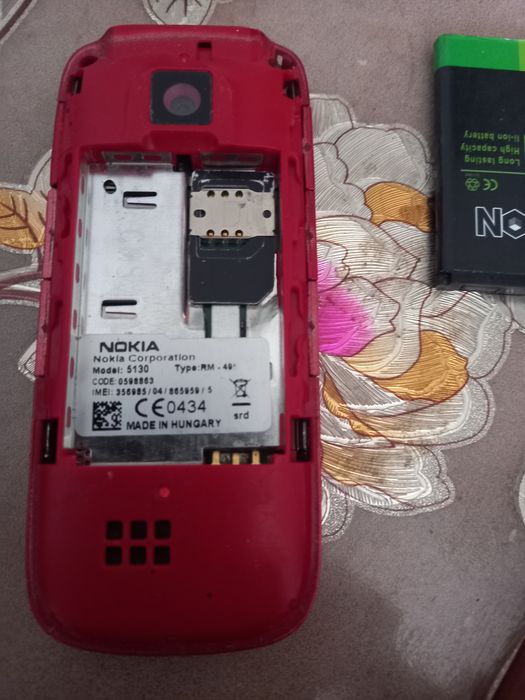 Два телефона мобильных