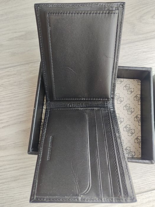 Продам оригинальный портмоне Guess