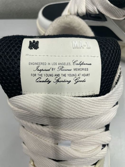 Amiri Black and White Trainers