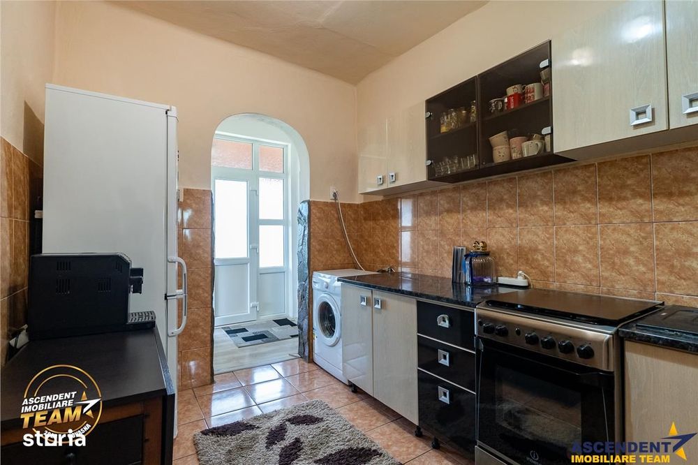 1.200mp teren si casa cu gradina inflorata, aproape de Targu Secuiesc: