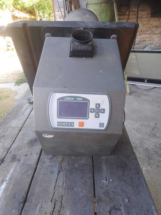 Комбиниран котел на пелети и дърва