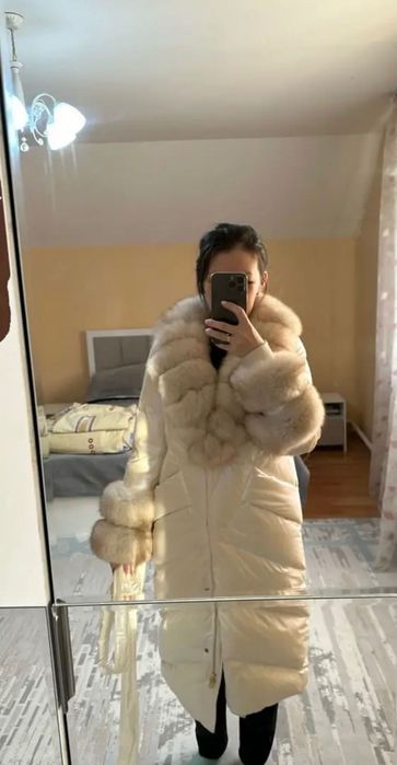Продам пуховик женский