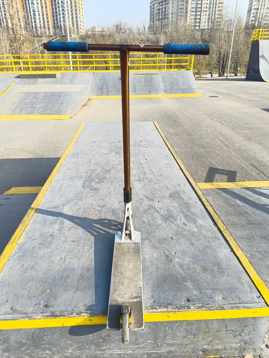 Самокат  трюковой