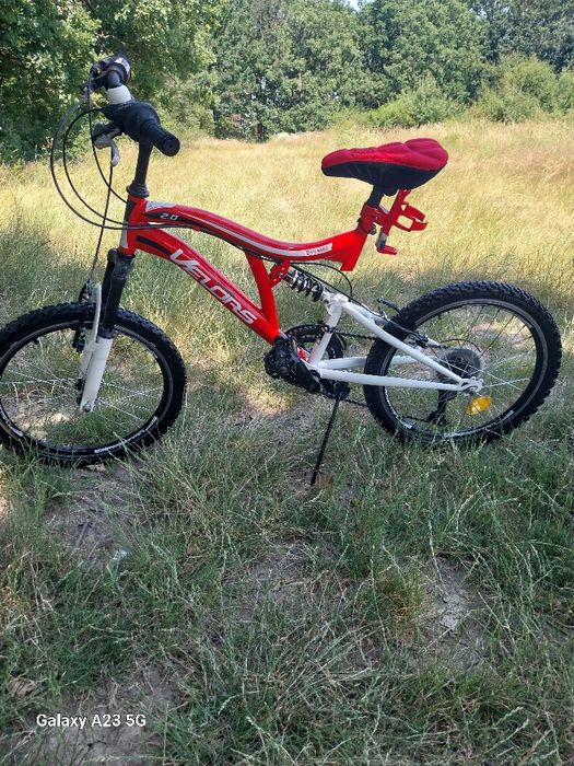 Vând bicicleta copii 20 ing