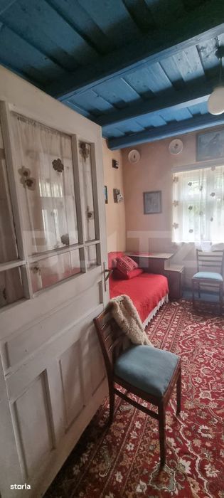 Casa cu doua corpuri