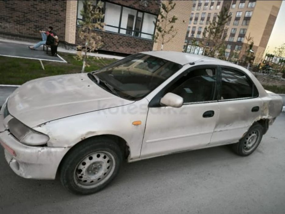 Продав автомобиль Mazda 323ba94  1.3