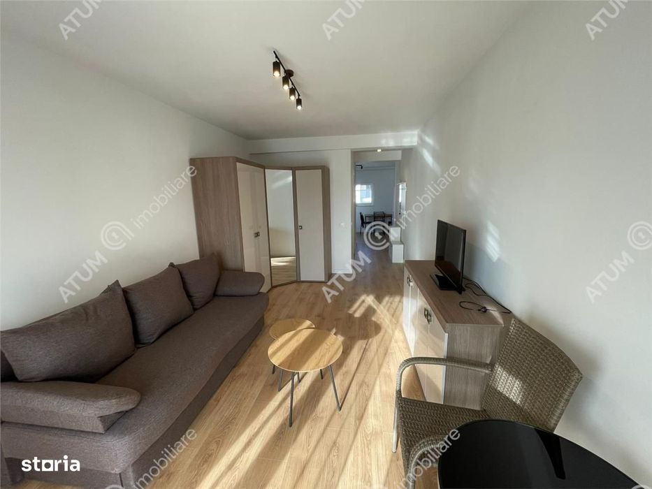 Garsoniera decomandata etaj 1 cu balcon si loc parcare in zona de Vest — fotografia 1