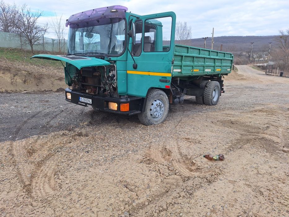 Man 18 t basculabil.