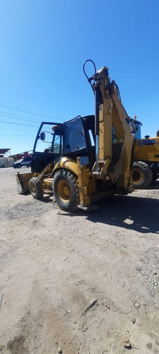 Услуги экскаватора погрузчика 3в1 трактор