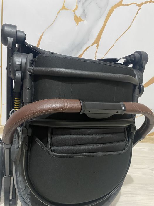 Коляска с маневренными колесами