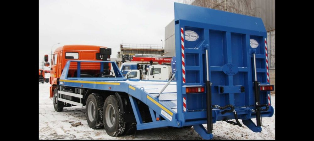 Услуги Эвакуватор перевозка кара экскаватор каток трал  трейлер