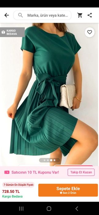 Новое турецкое зеленое платье ниже колен.