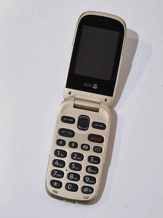 Telefon cu clapeta cu încărcător