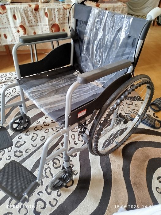 Инвалидная коляска (новая)