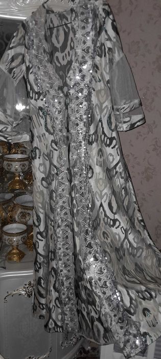 Kelin Salom uchun qo'l mehnatida tikilgan choponlar