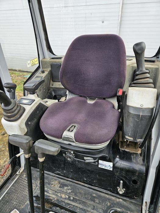 Miniexcavator powertilt