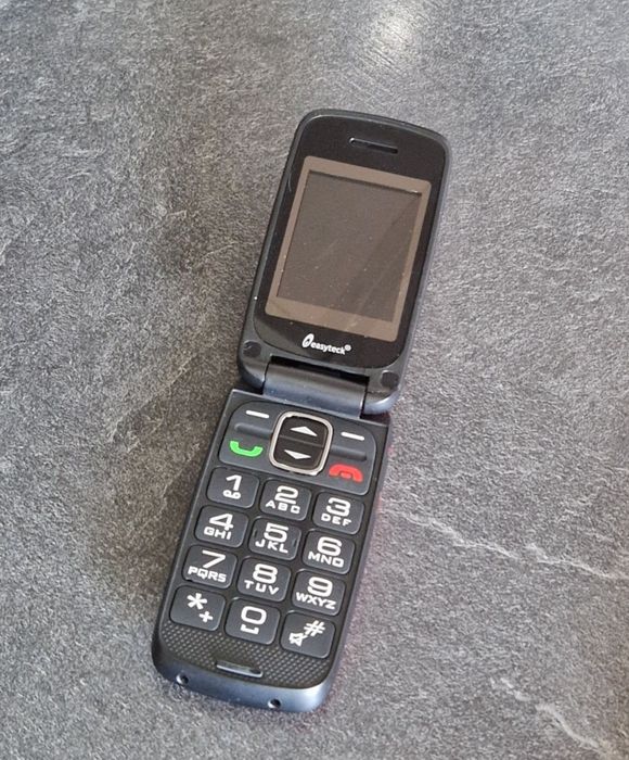 Telefon cu clapeta.  Pret/ bucata
