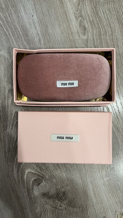 Очки овальные miu miu