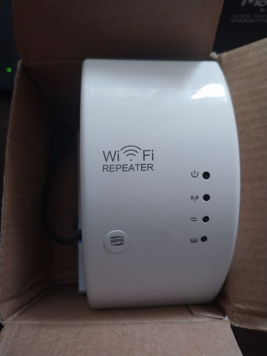 Vând wireless-n wifi repeater