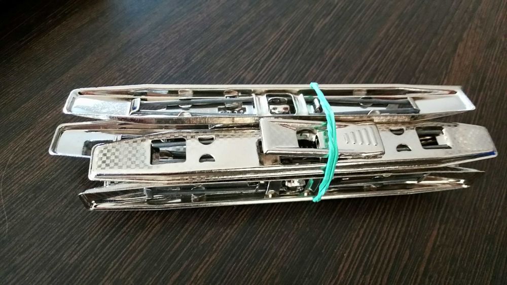 Зажимный механизм для офисных папок