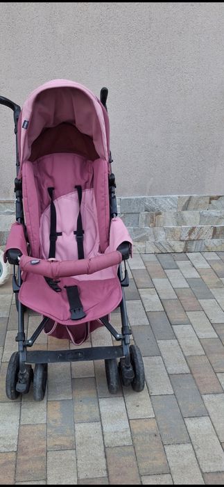 Carucior pt copii foarte bine intretinut de culoare roz