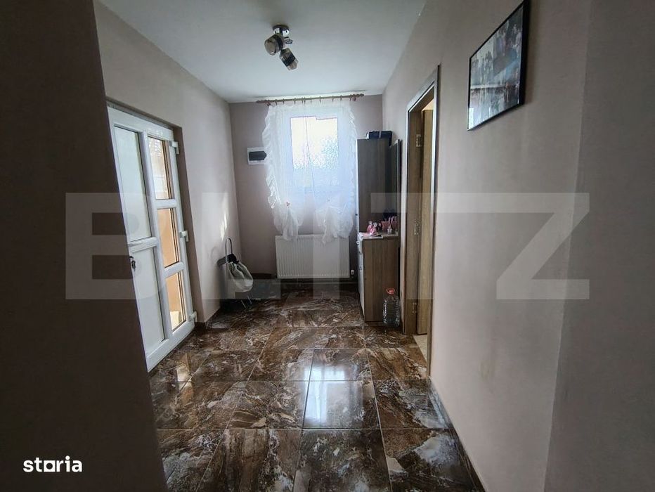 Casa cu 3 camere,baie, bucatarie, teren 500 mp