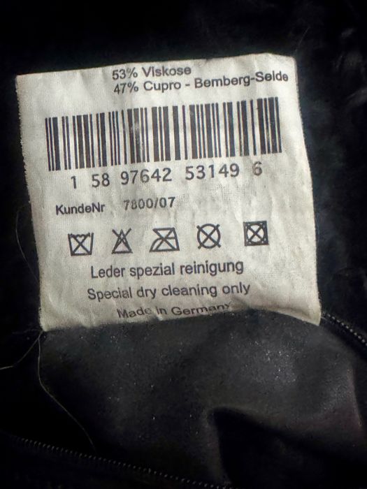 Кожанная куртка с каракулем