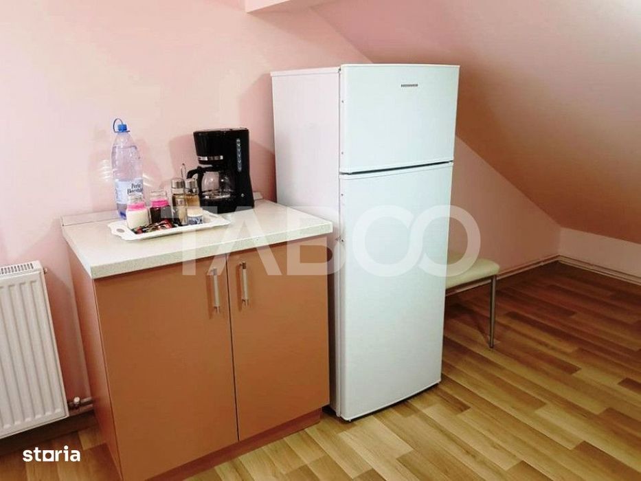 Apartament de inchiriat  56 mpu 2 camere mansarda in vila Selimbar
