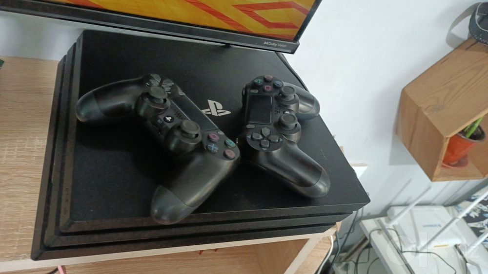 PlayStation 4 Pro 1 ТБ + 2 джойстика + игра + подписка PS PLUS ЛЮКС