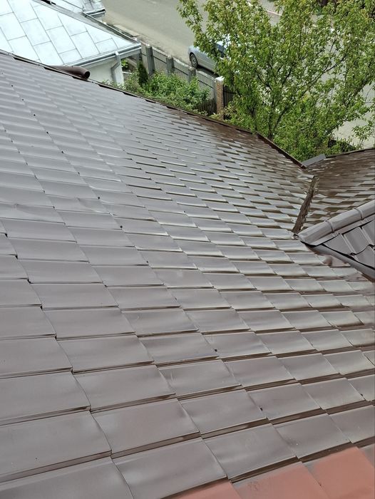 Vopsim  tabla pe acoperis