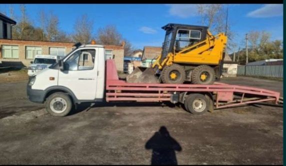 Услуги Мини погрузчика/эвакуатор
